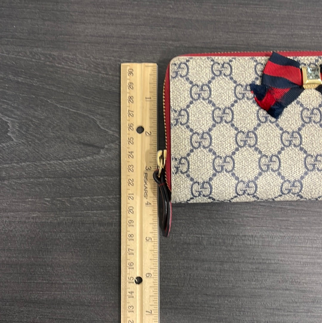 SOLD! Gucci GG Canvas Wallet