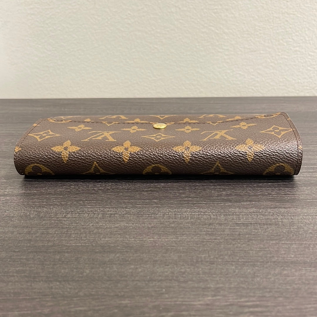 SOLD! Louis Vuitton Monogram Fleuri Sarah Wallet