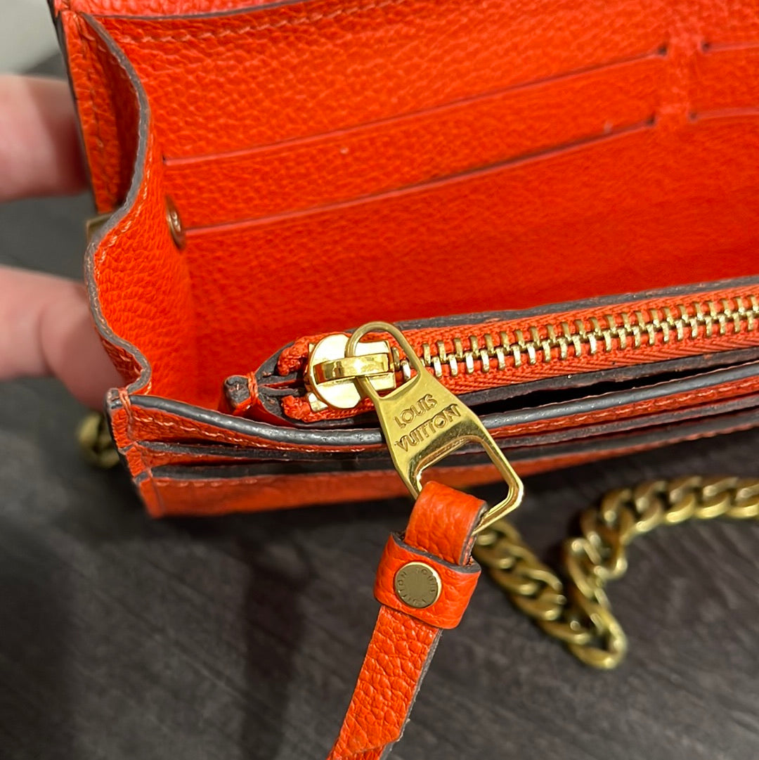 SOLD! Louis Vuitton Monogram Empreinte Orange Wallet on Chain