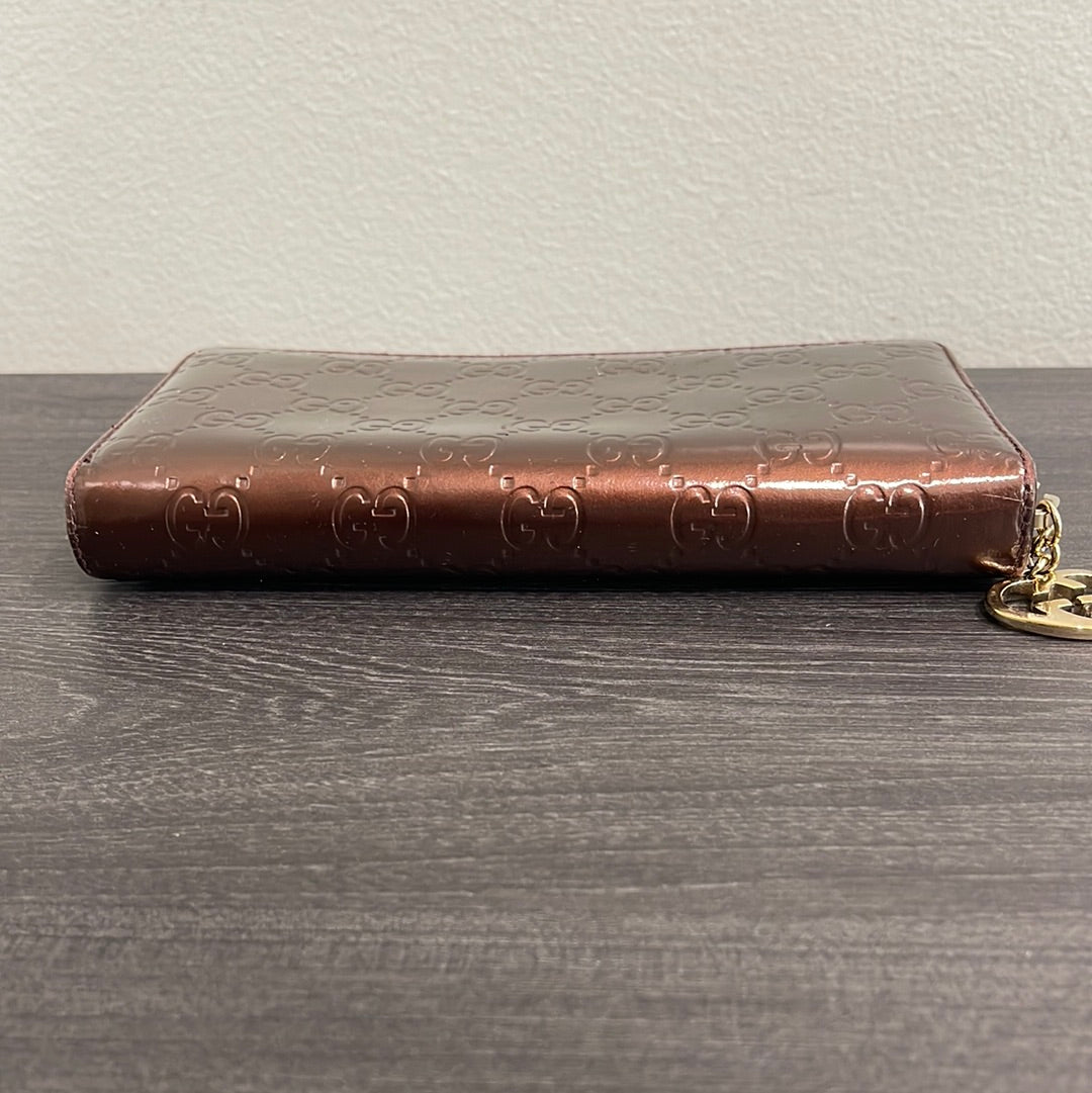 SOLD! Gucci GG Leather Zippy Wallet