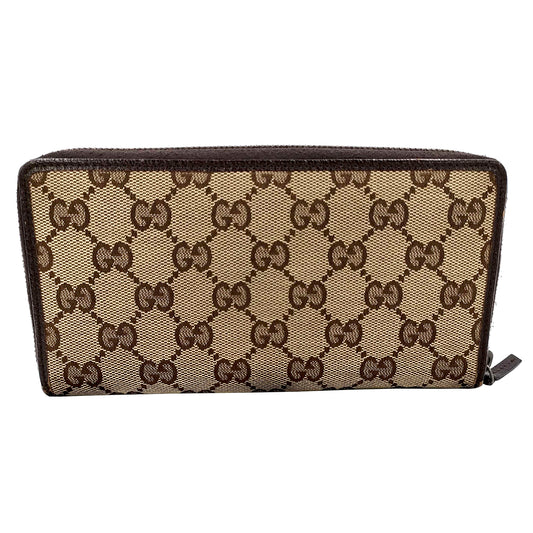 #1174 GUCCI GG Canvas Zippy Wallet