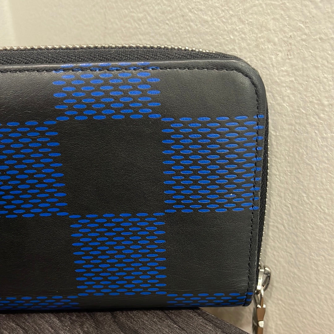 SOLD! Louis Vuitton Damier Infini Zip Wallet