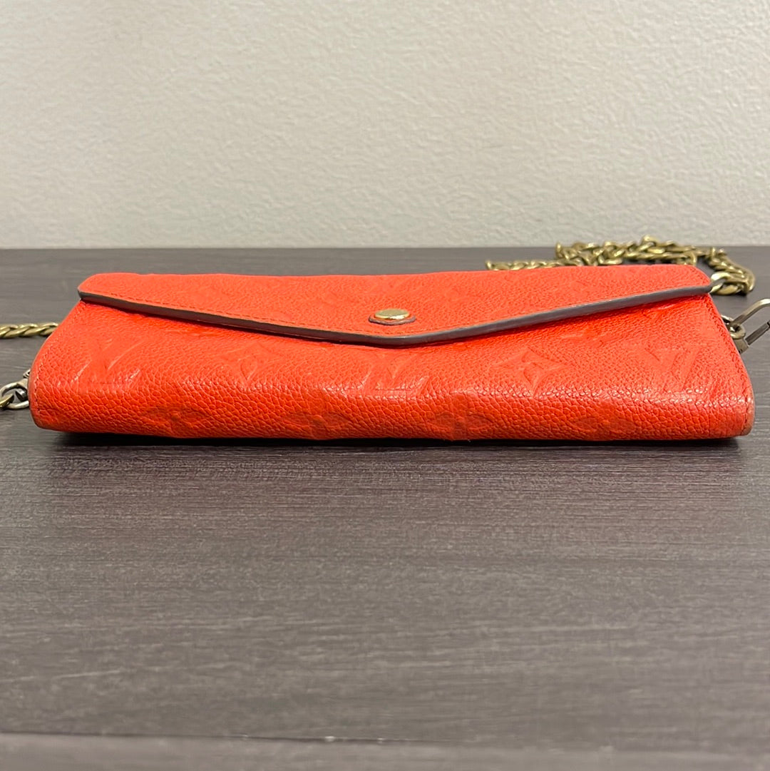 SOLD! Louis Vuitton Monogram Empreinte Orange Wallet on Chain