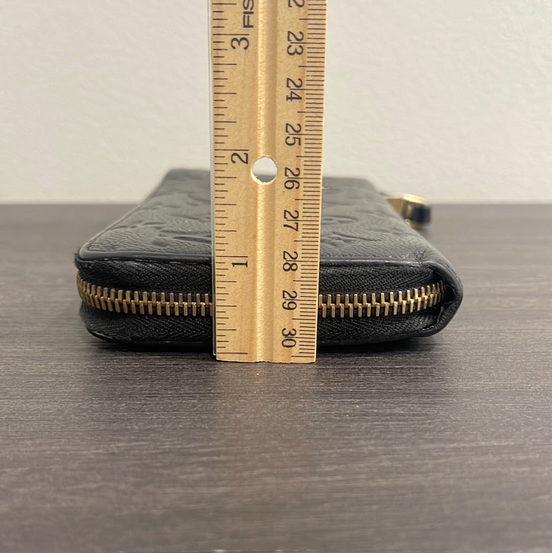 SOLD! Louis Vuitton Empreinte Zippy Wallet