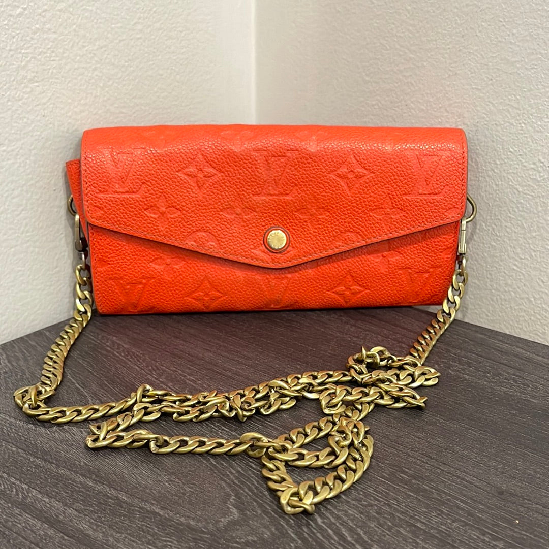 SOLD! Louis Vuitton Monogram Empreinte Orange Wallet on Chain