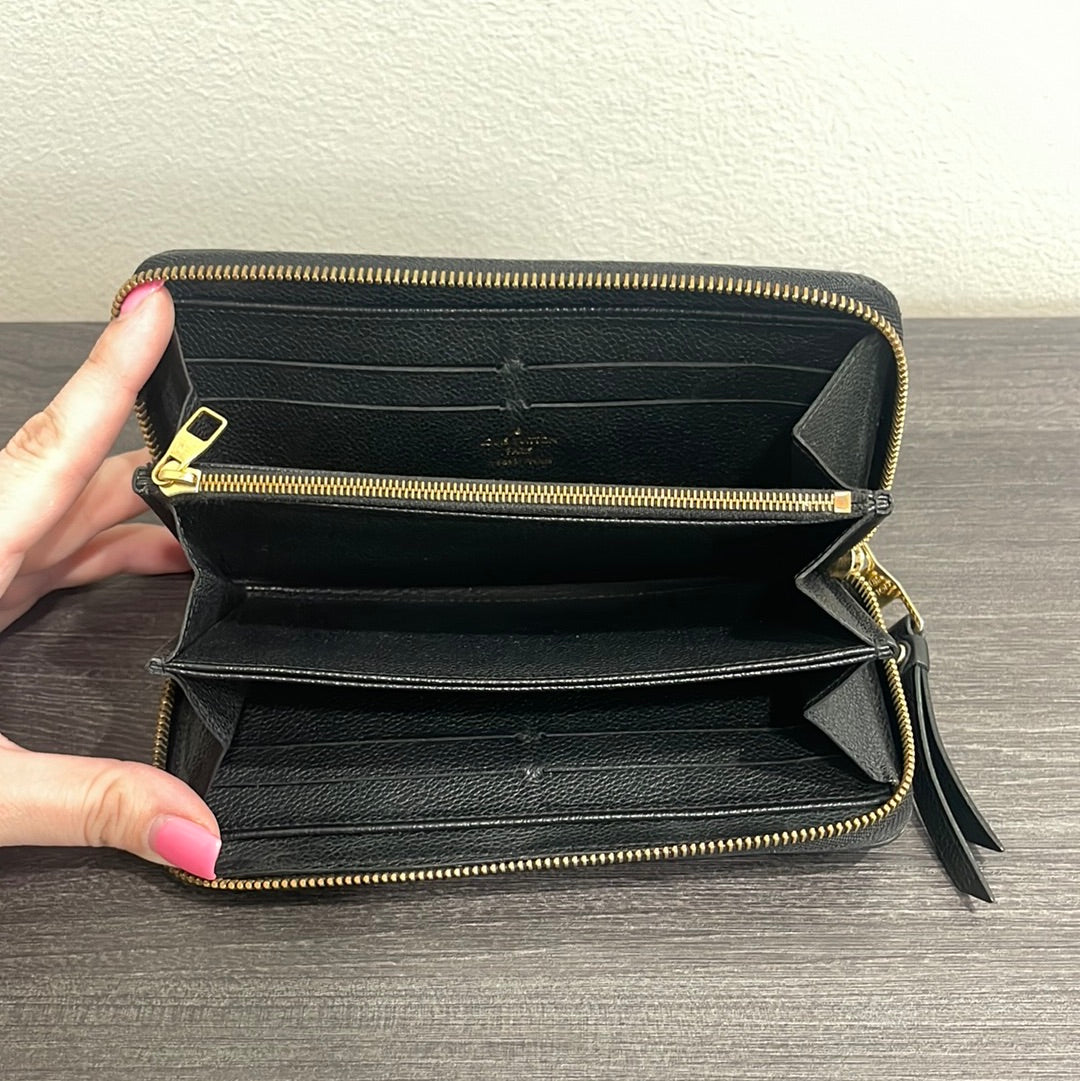 SOLD! Louis Vuitton Empreinte Zippy Wallet