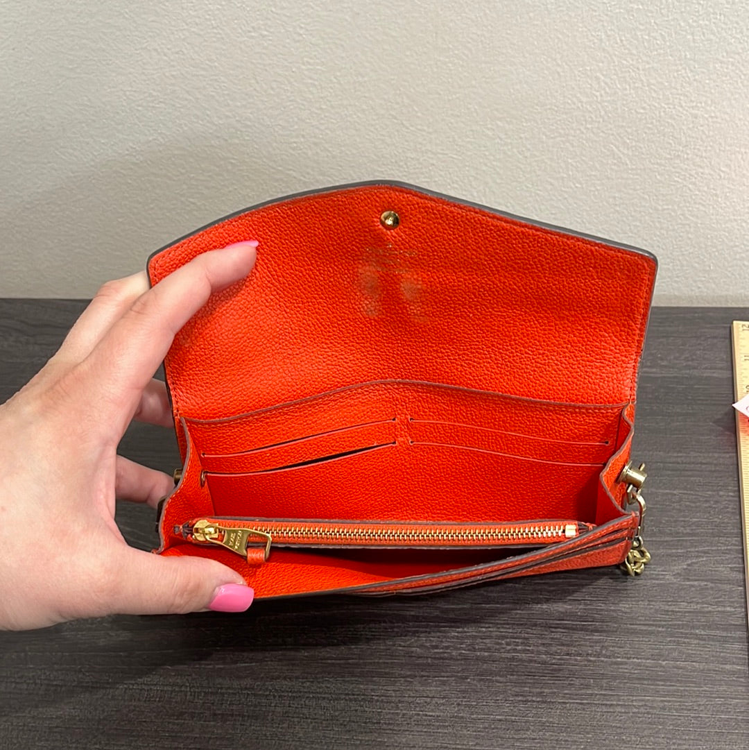 SOLD! Louis Vuitton Monogram Empreinte Orange Wallet on Chain