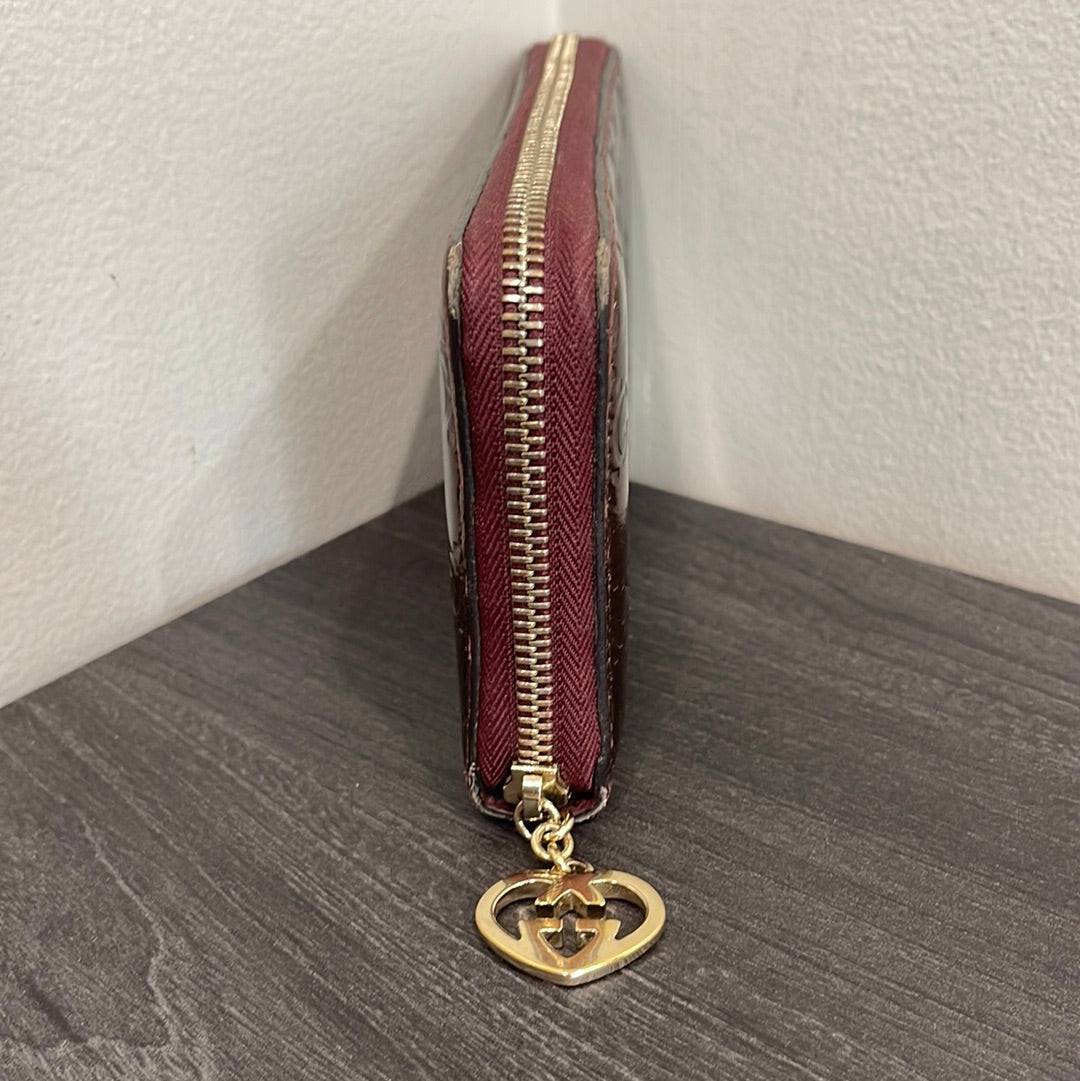 SOLD! Gucci GG Leather Zippy Wallet