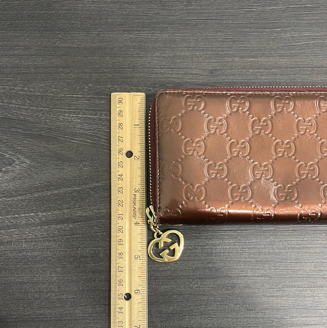 SOLD! Gucci GG Leather Zippy Wallet