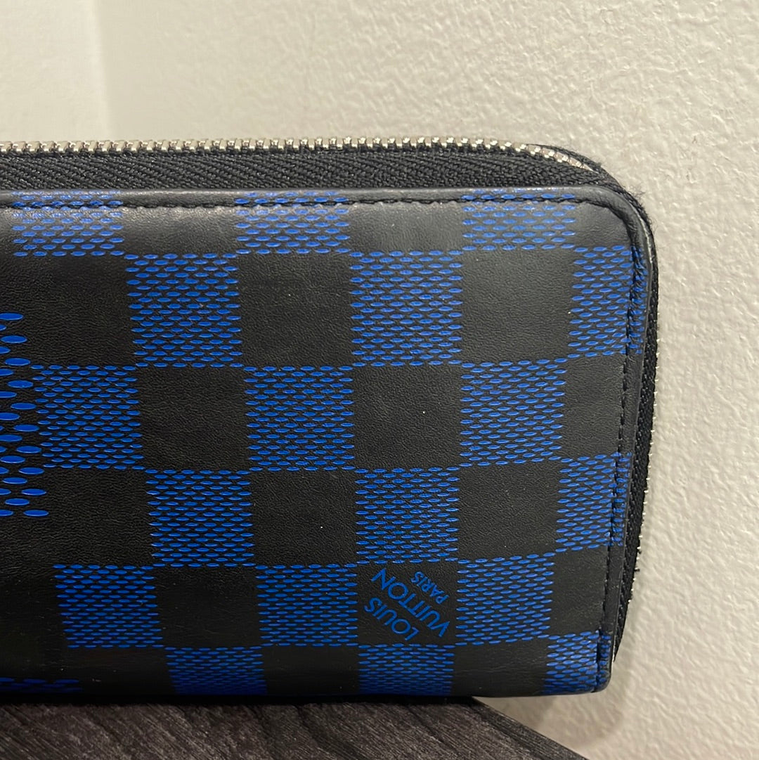 SOLD! Louis Vuitton Damier Infini Zip Wallet
