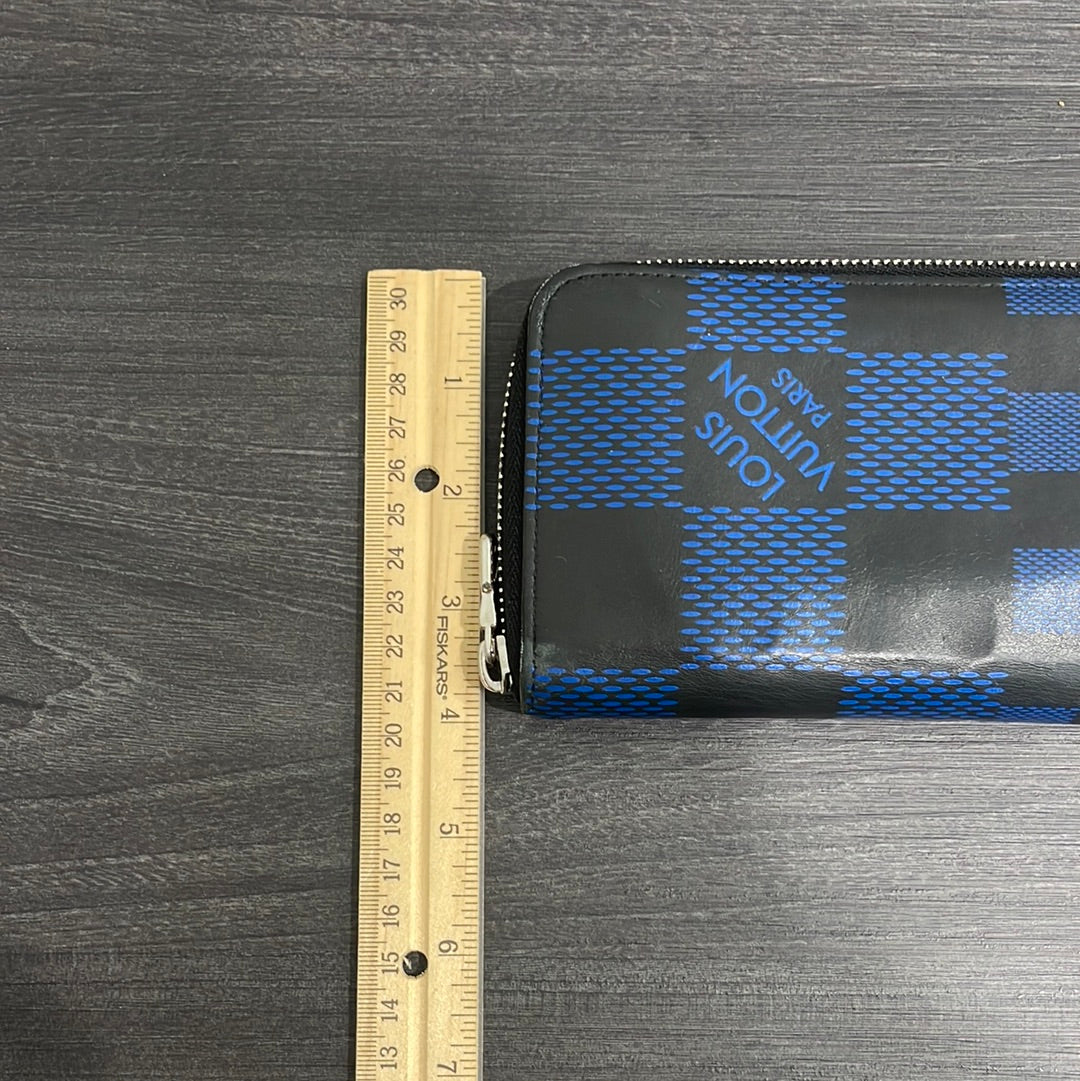 SOLD! Louis Vuitton Damier Infini Zip Wallet
