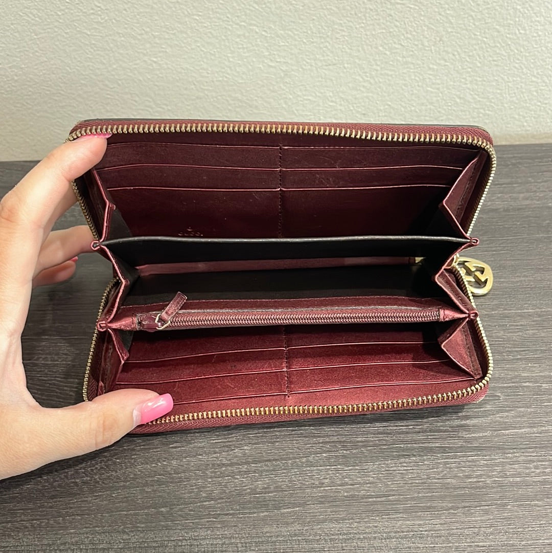 SOLD! Gucci GG Leather Zippy Wallet