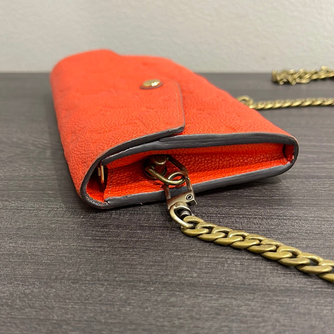 SOLD! Louis Vuitton Monogram Empreinte Orange Wallet on Chain