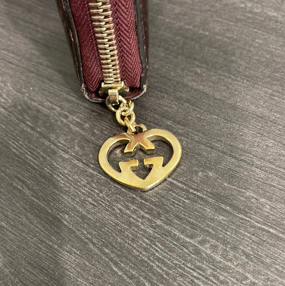SOLD! Gucci GG Leather Zippy Wallet