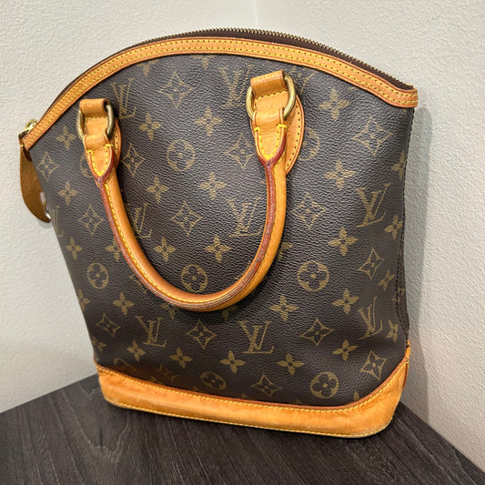 #401 LOUIS VUITTON Rockit w/ LV Lock & Key