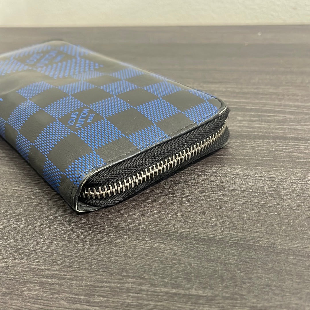 SOLD! Louis Vuitton Damier Infini Zip Wallet