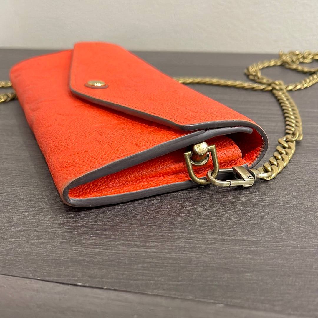 SOLD! Louis Vuitton Monogram Empreinte Orange Wallet on Chain