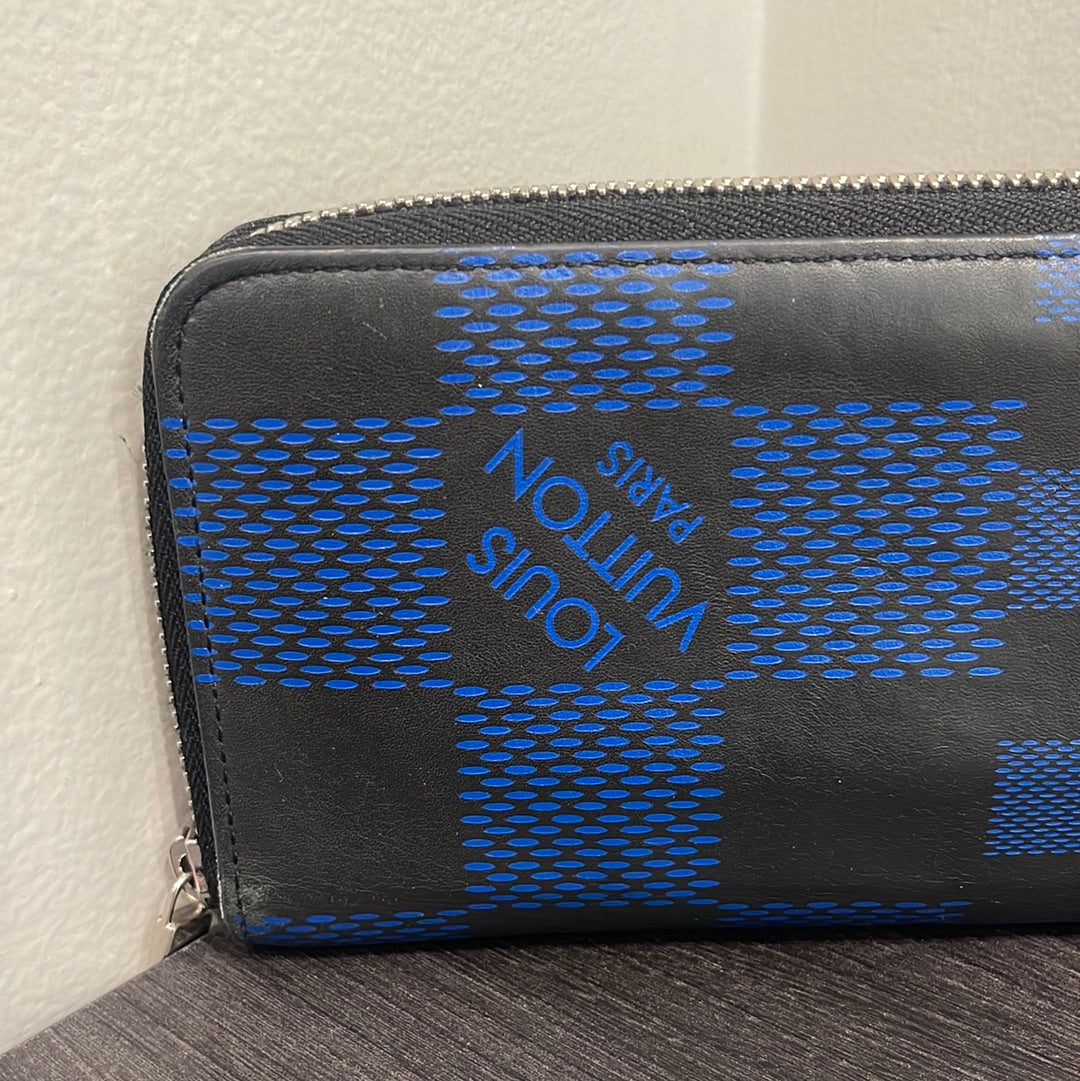 SOLD! Louis Vuitton Damier Infini Zip Wallet