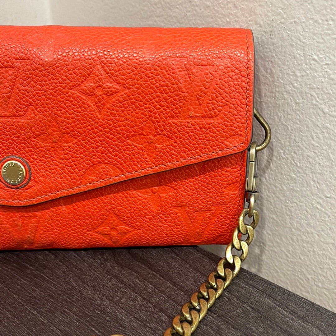 SOLD! Louis Vuitton Monogram Empreinte Orange Wallet on Chain