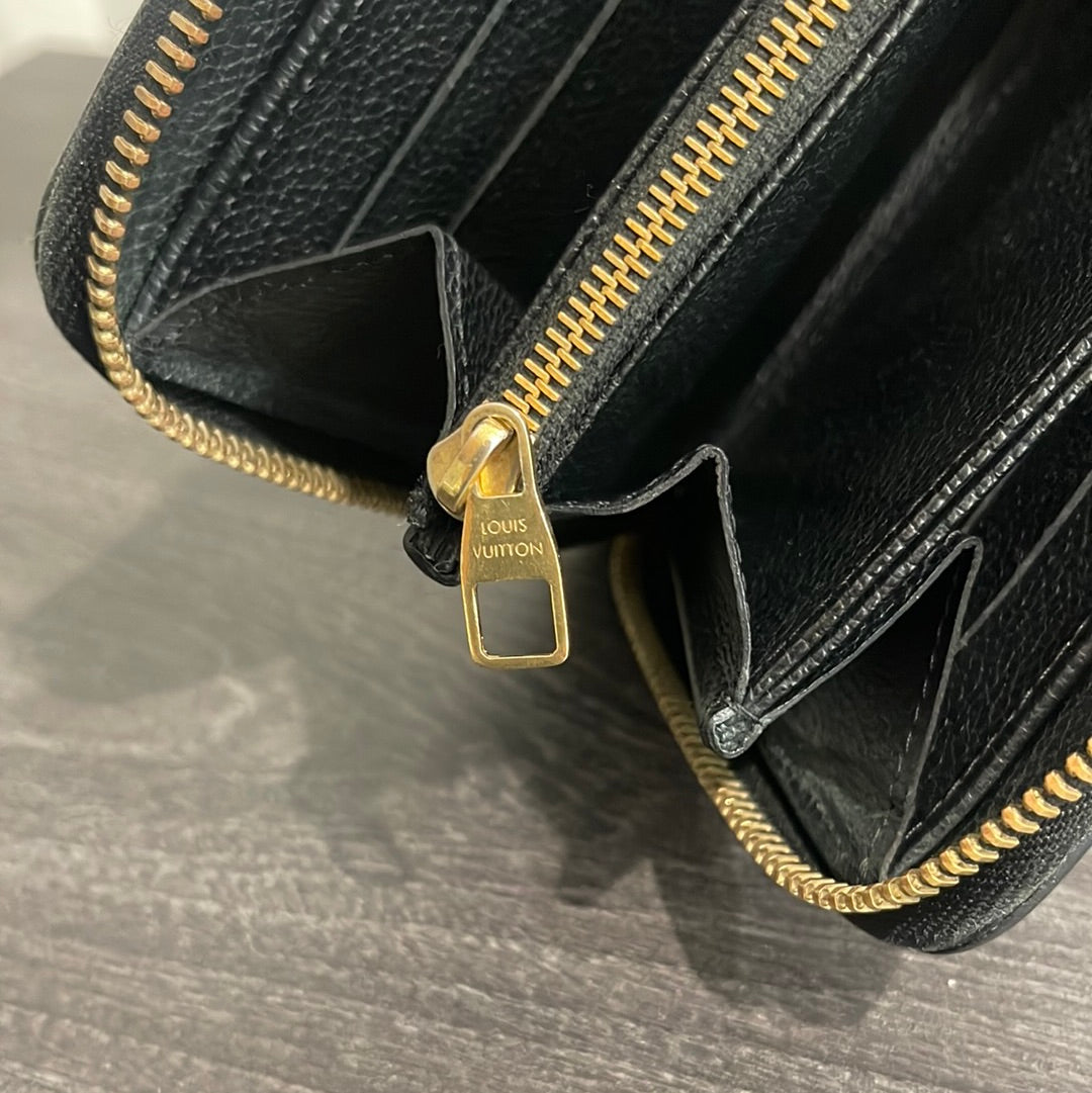 SOLD! Louis Vuitton Empreinte Zippy Wallet