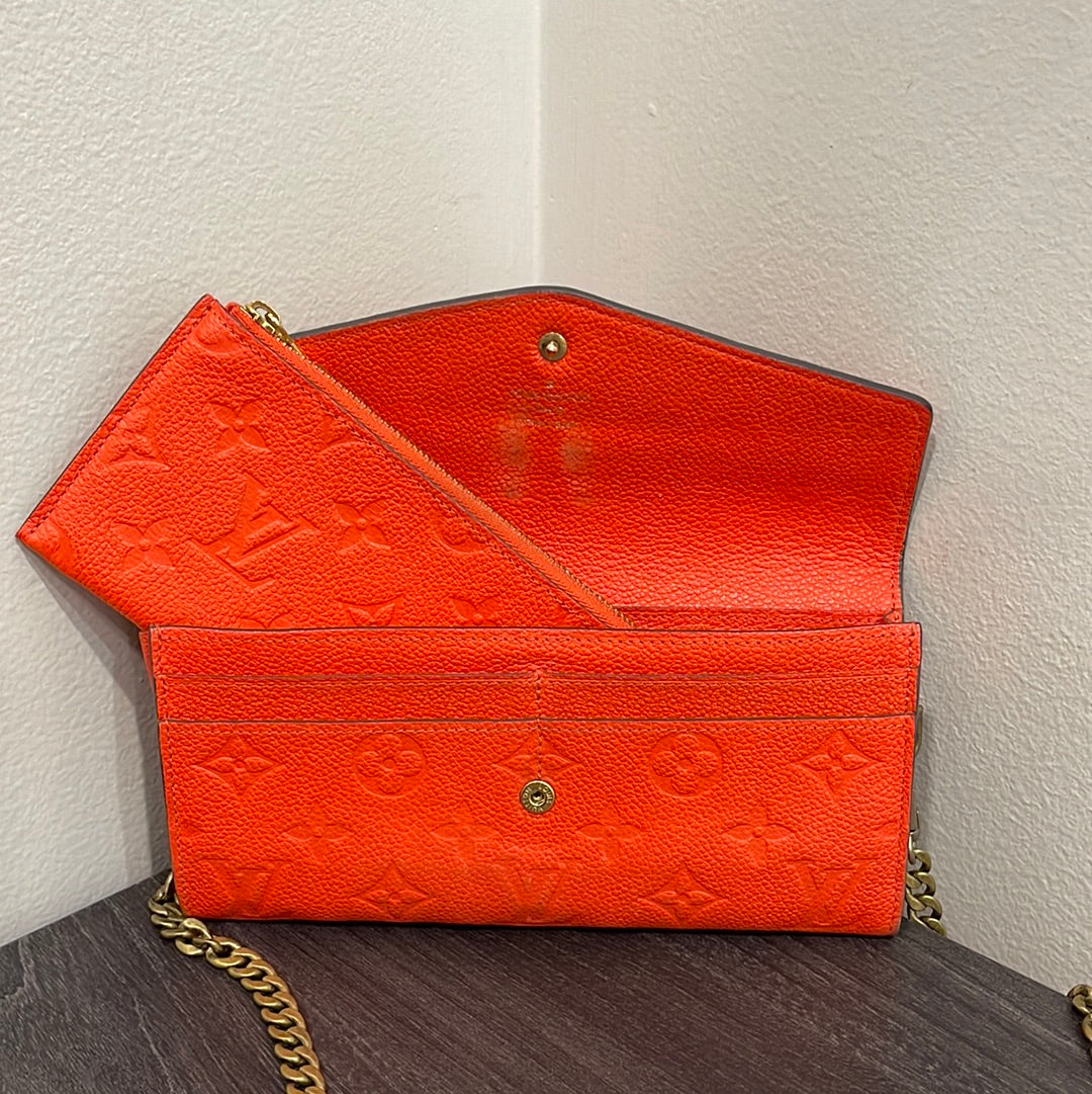SOLD! Louis Vuitton Monogram Empreinte Orange Wallet on Chain