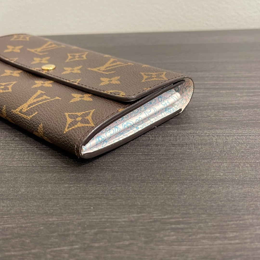 SOLD! Louis Vuitton Monogram Fleuri Sarah Wallet