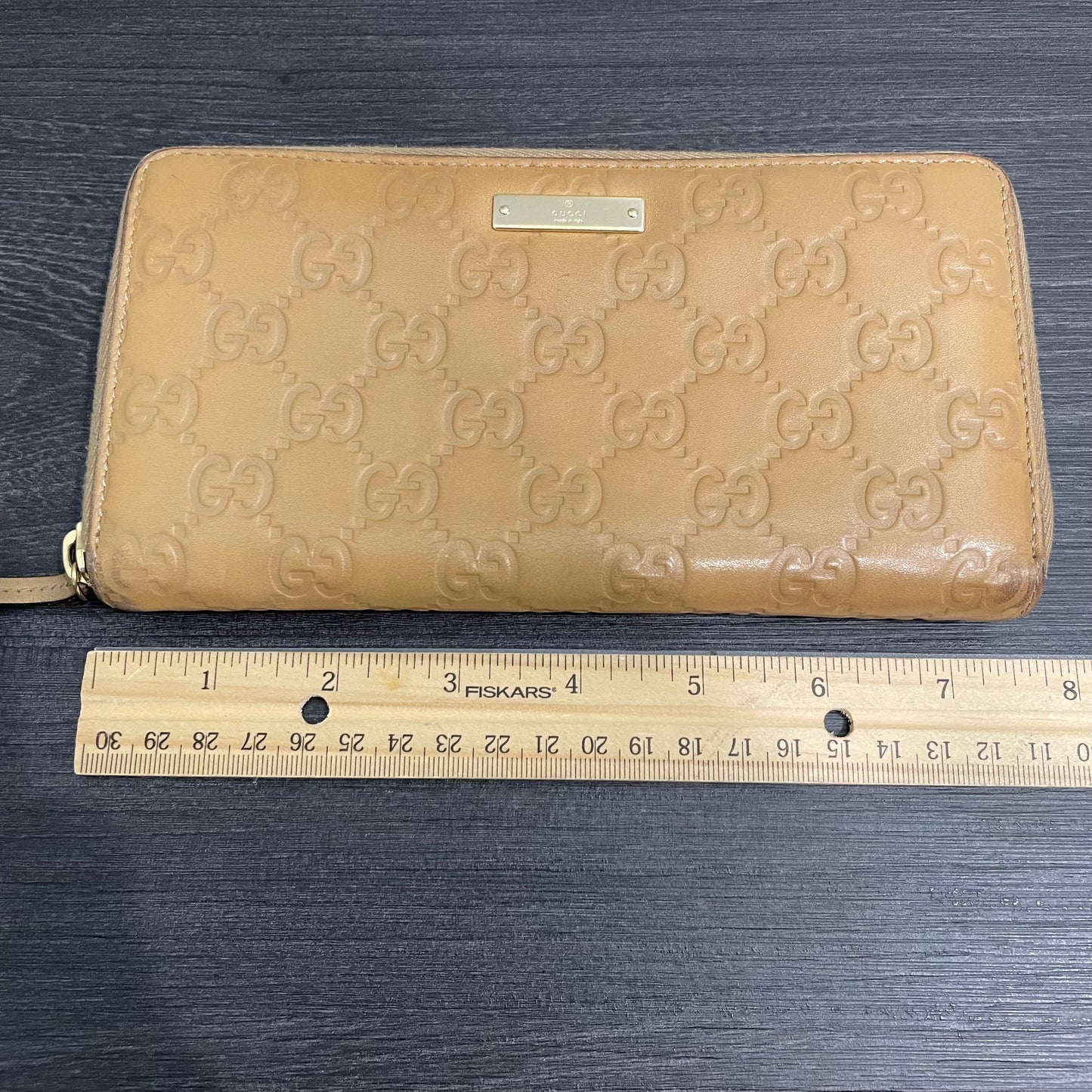#168 GUCCI Nude GG Leather Zippy Wallet