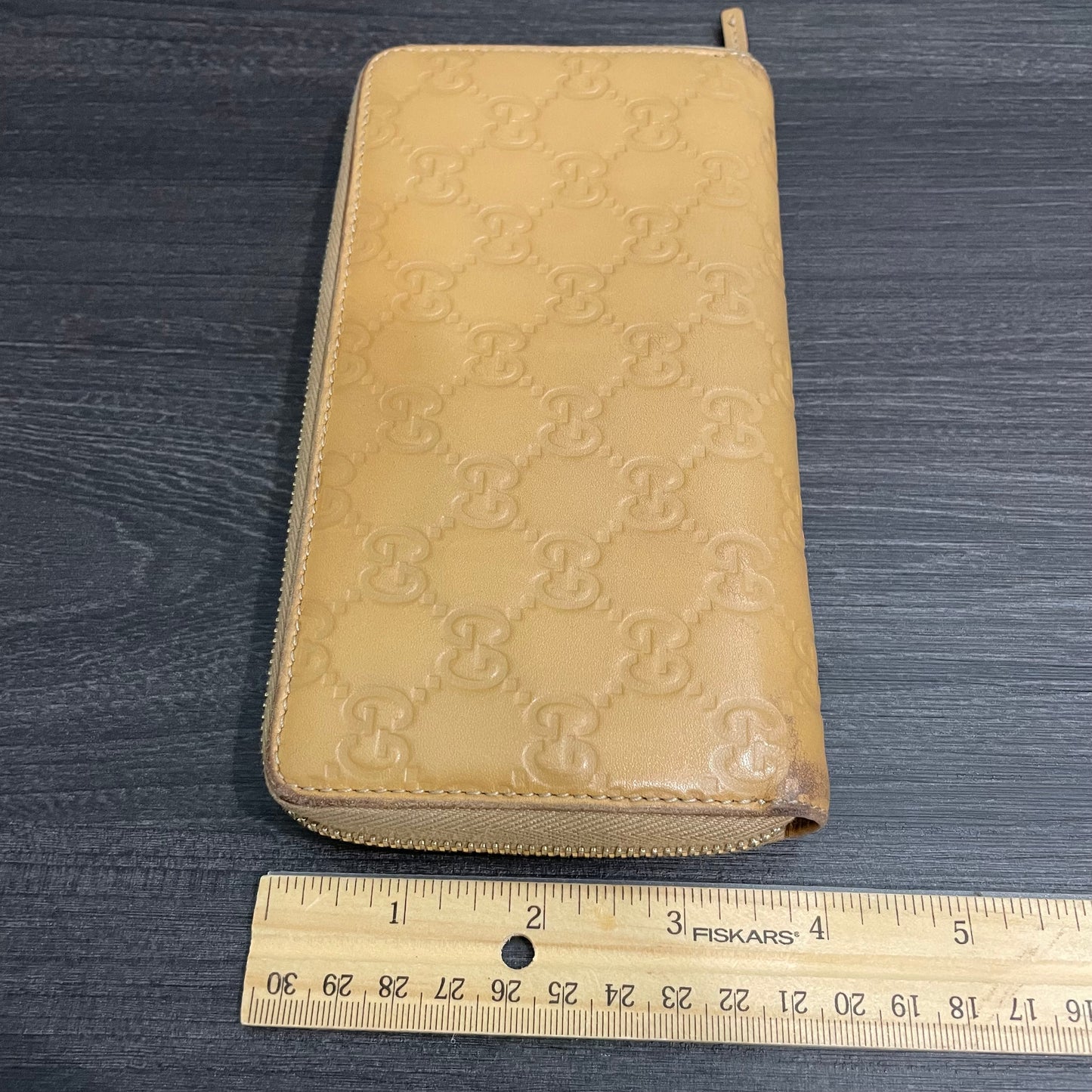#168 GUCCI Nude GG Leather Zippy Wallet