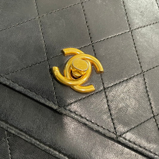 CHANEL Quilted Lambskin Classic Double Flap Bag (24 kt Gold-plated Hardware)