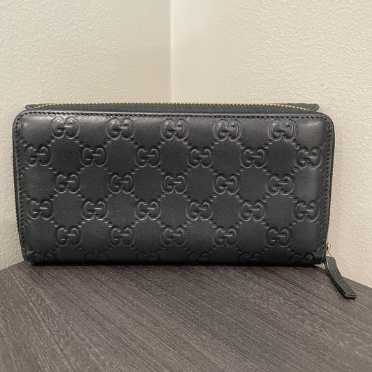 #902 GUCCI Black Leather Dual Zippy & Trifold Wallet