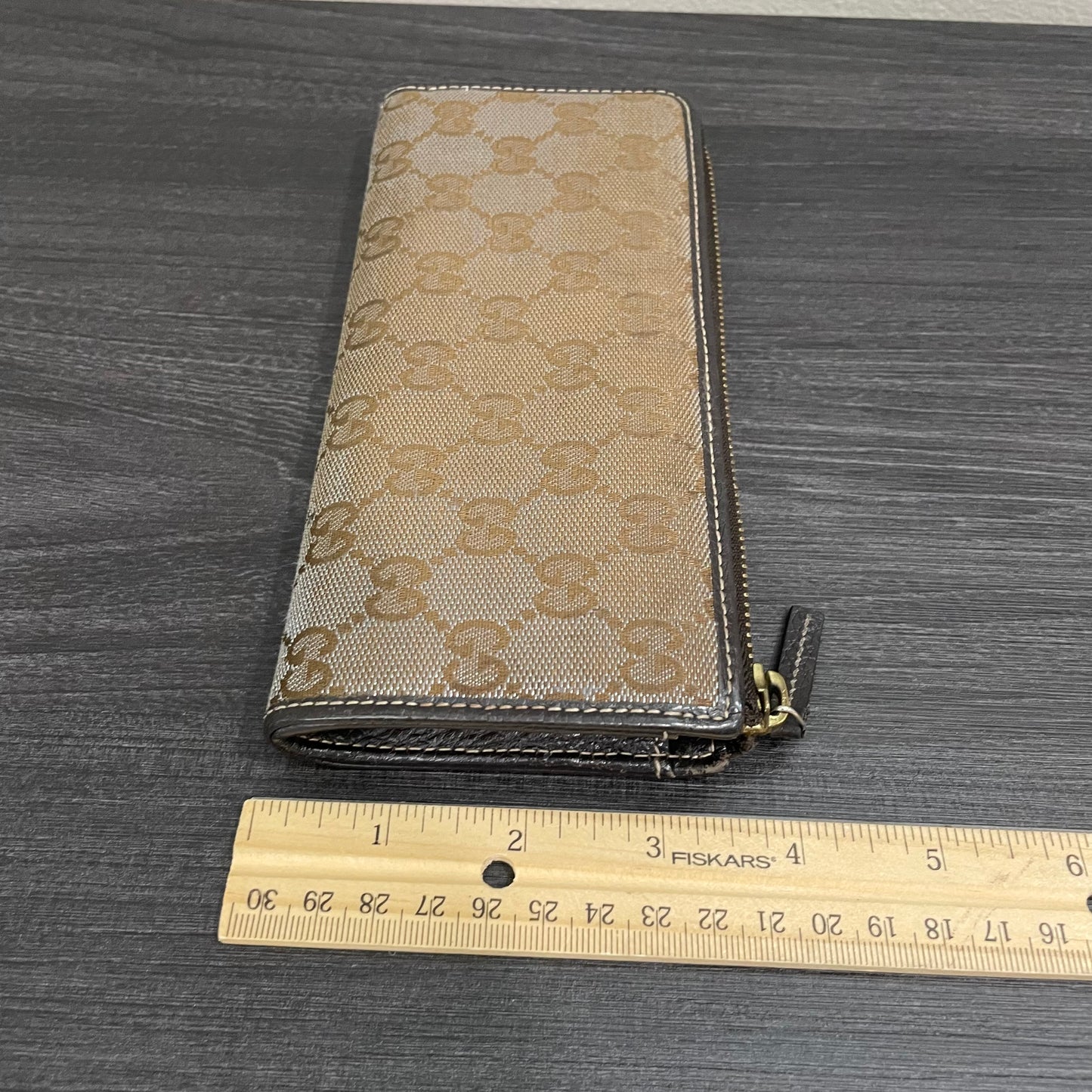 GUCCI GG Brown Shimmer Canvas Zippy Wallet