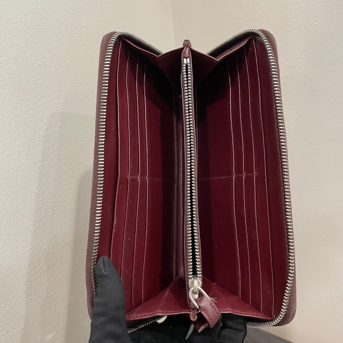 #128 PRADA Plum Leather Zippy Wallet