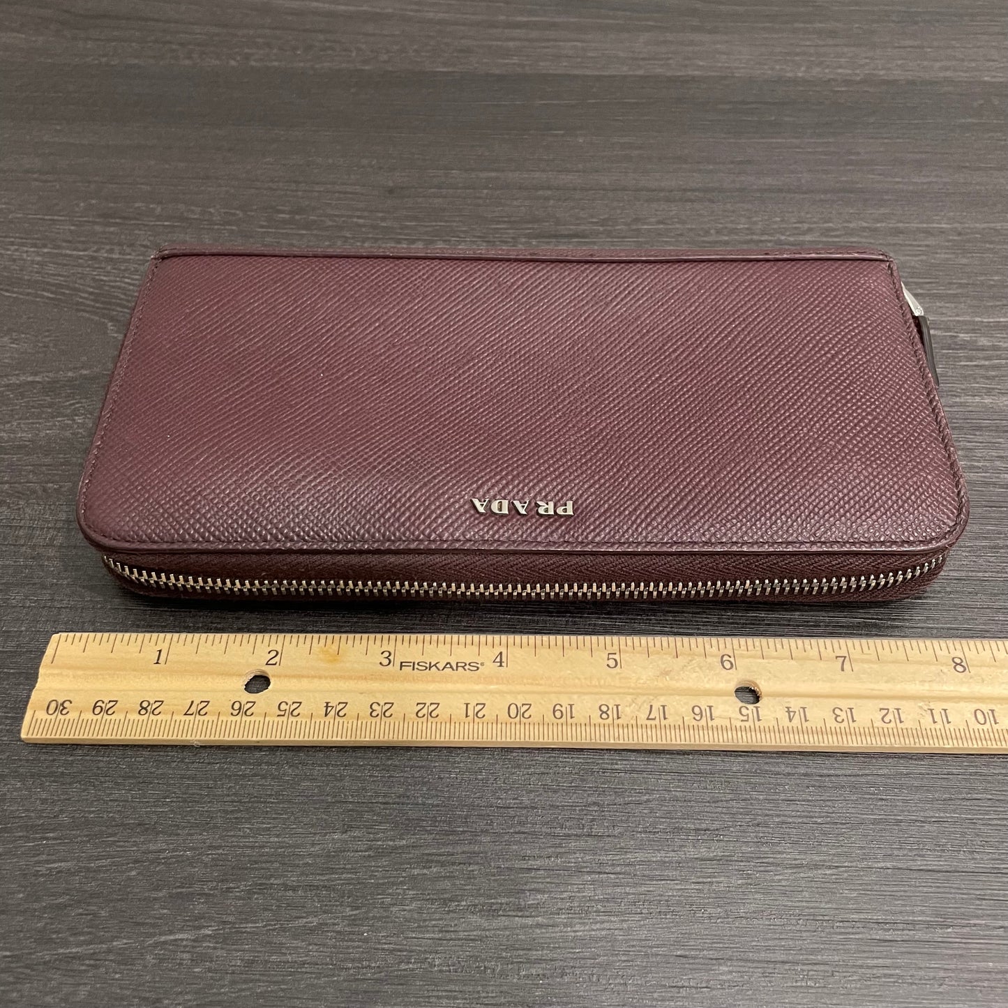 #128 PRADA Plum Leather Zippy Wallet