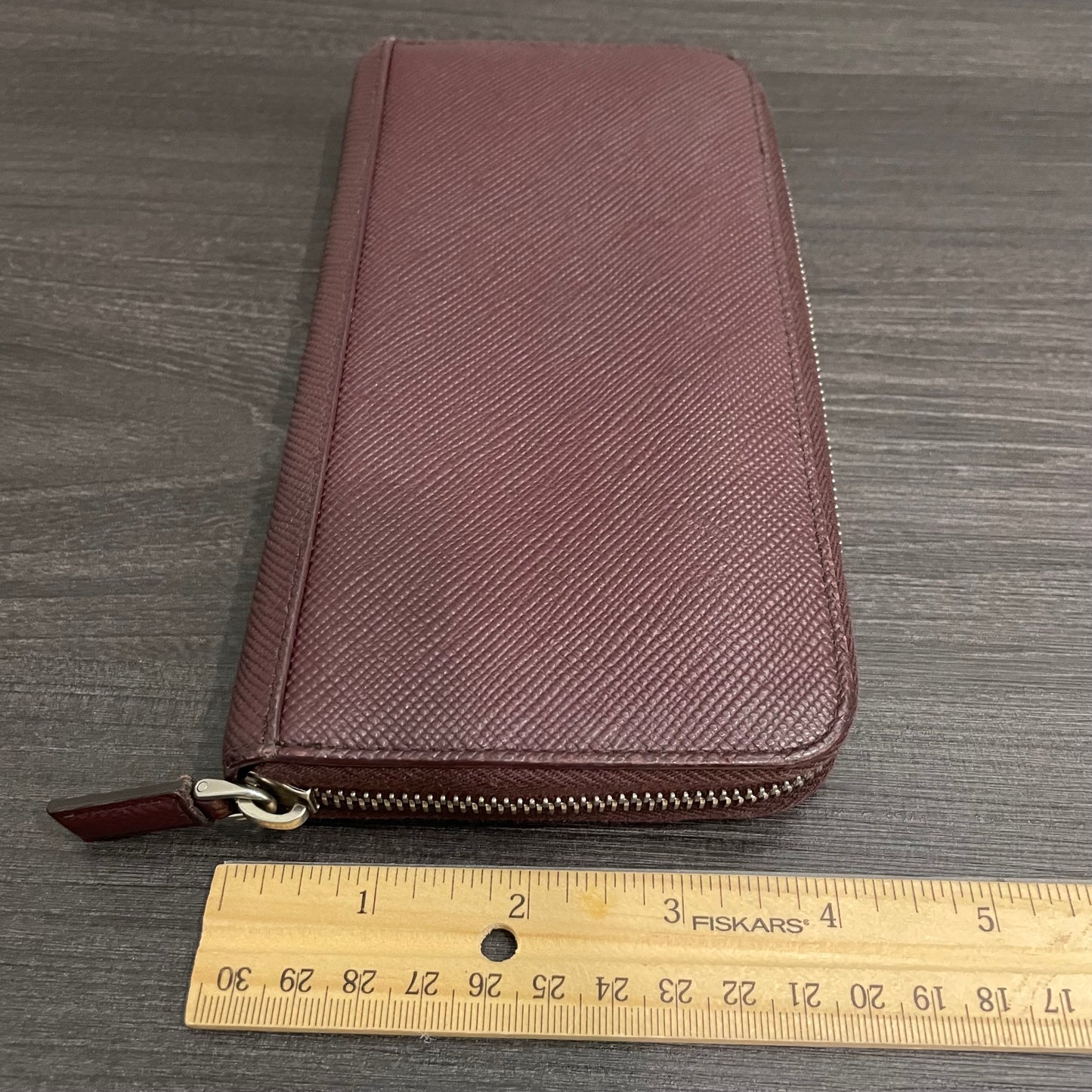 #128 PRADA Plum Leather Zippy Wallet