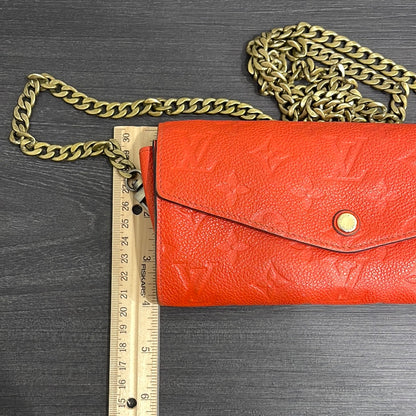 SOLD! Louis Vuitton Monogram Empreinte Orange Wallet on Chain