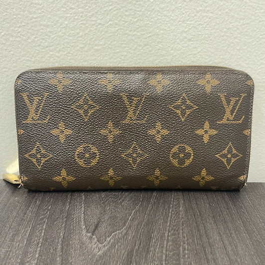 SOLD! Louis Vuitton Monogram Zippy Wallet