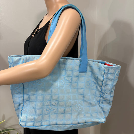 #106 CHANEL Blue Tote