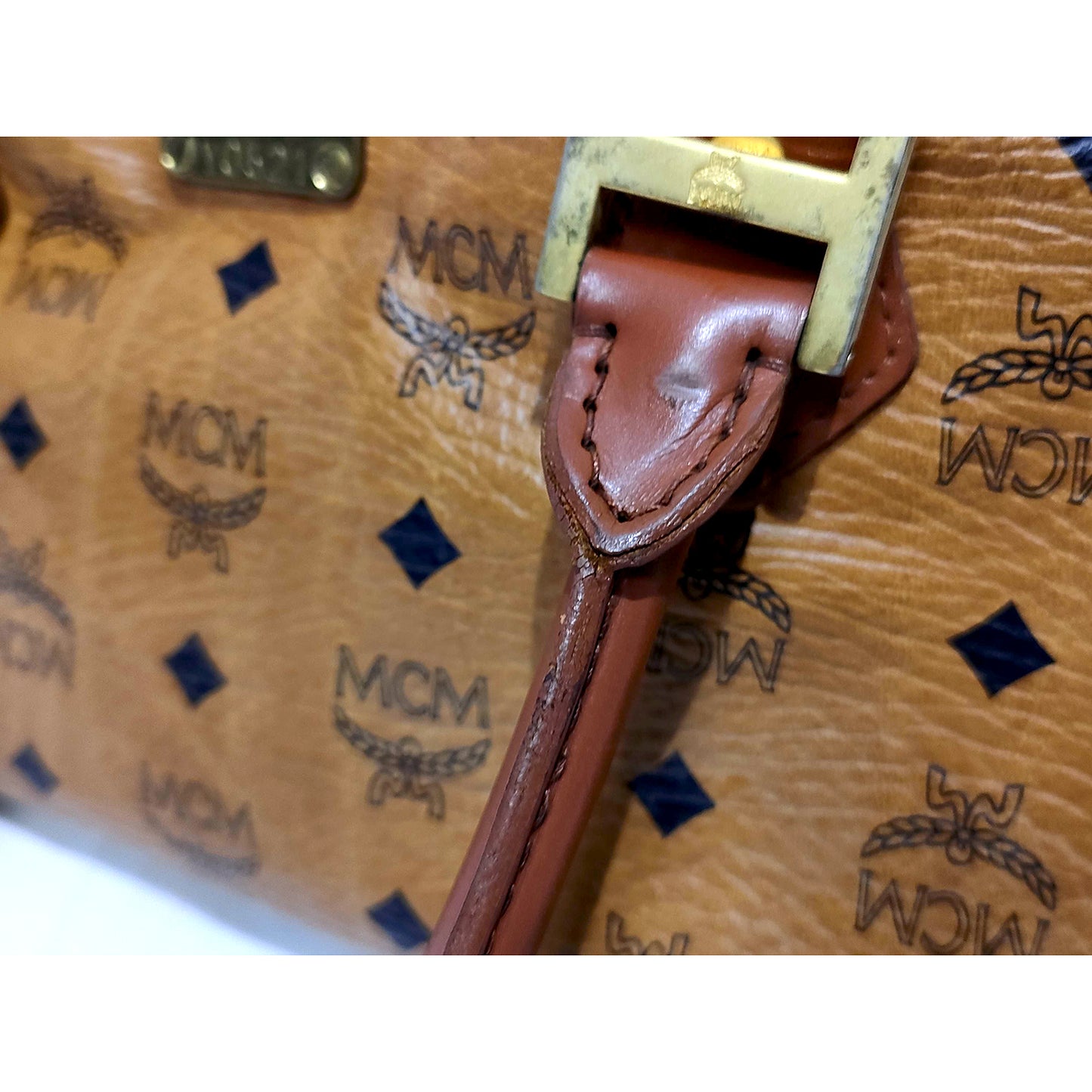 #1142 MCM Boston 32 Bag in Cognac Visetos