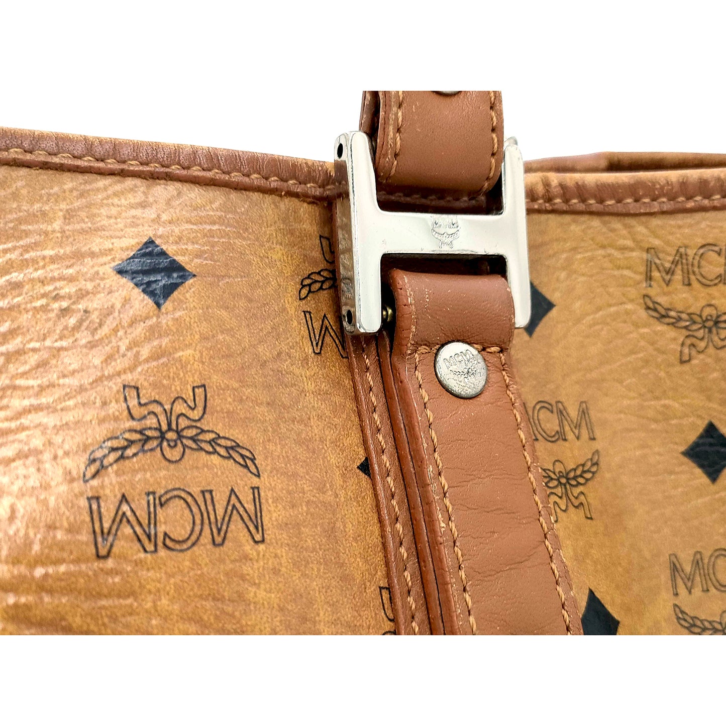 #1138 MCM Shoulder Tote in Cognac Visetos (Lipstick Staining)