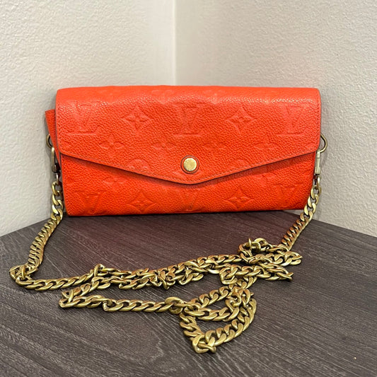 SOLD! Louis Vuitton Monogram Empreinte Orange Wallet on Chain