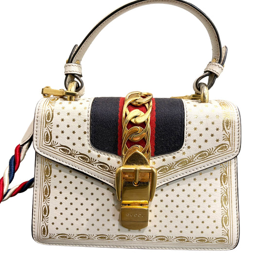#3221 GUCCI Limited Edition Gold Stars Sylvie Mini Top Handle & Crossbody Bag
