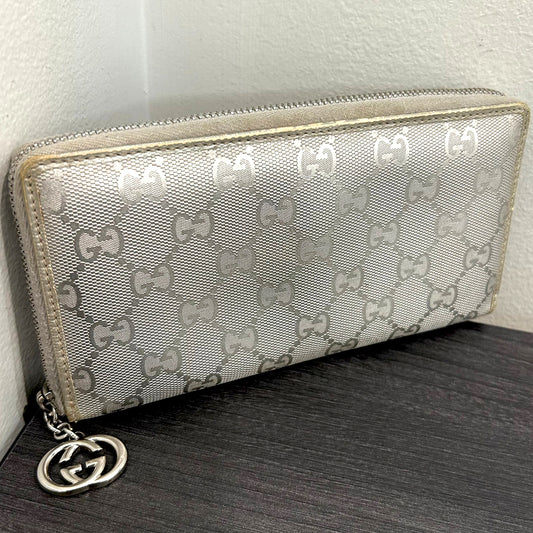 #207 GUCCI  Zip Wallet