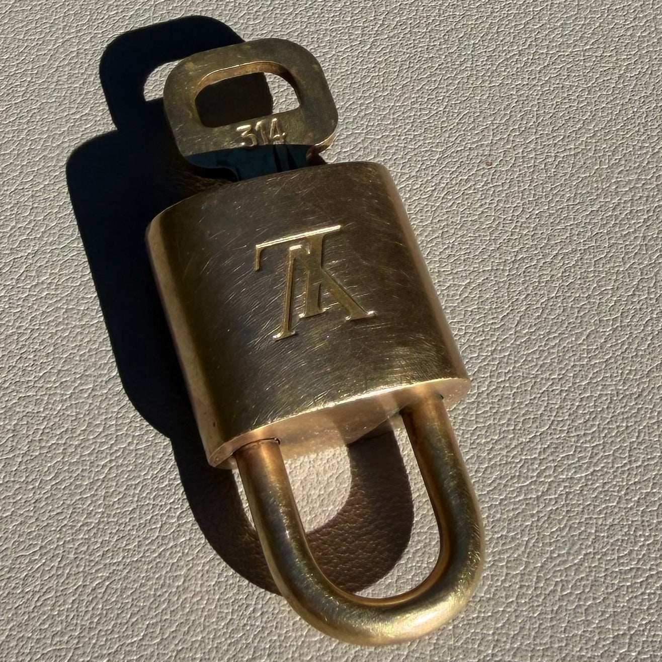 #1101-11 LOUIS VUITTON Lock & Key No. 314
