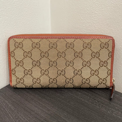 #192 GUCCI GG Canvas Zippy Wallet