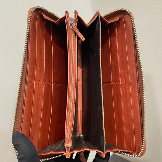 #192 GUCCI GG Canvas Zippy Wallet