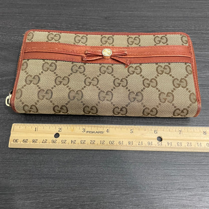 #192 GUCCI GG Canvas Zippy Wallet