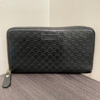 #104 GUCCI Black Microguccissima Zip Around Wallet Testa di Moro