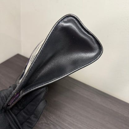 #1063 GUCCI GG Coated Canvas Pouch