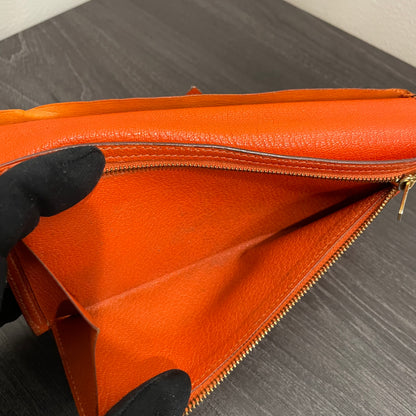 #134 Hermès Orange Leather Long Wallet