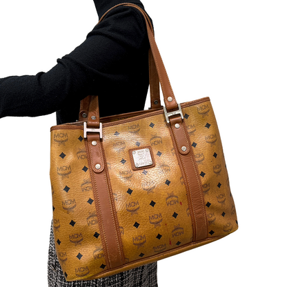 #1138 MCM Shoulder Tote in Cognac Visetos (Lipstick Staining)